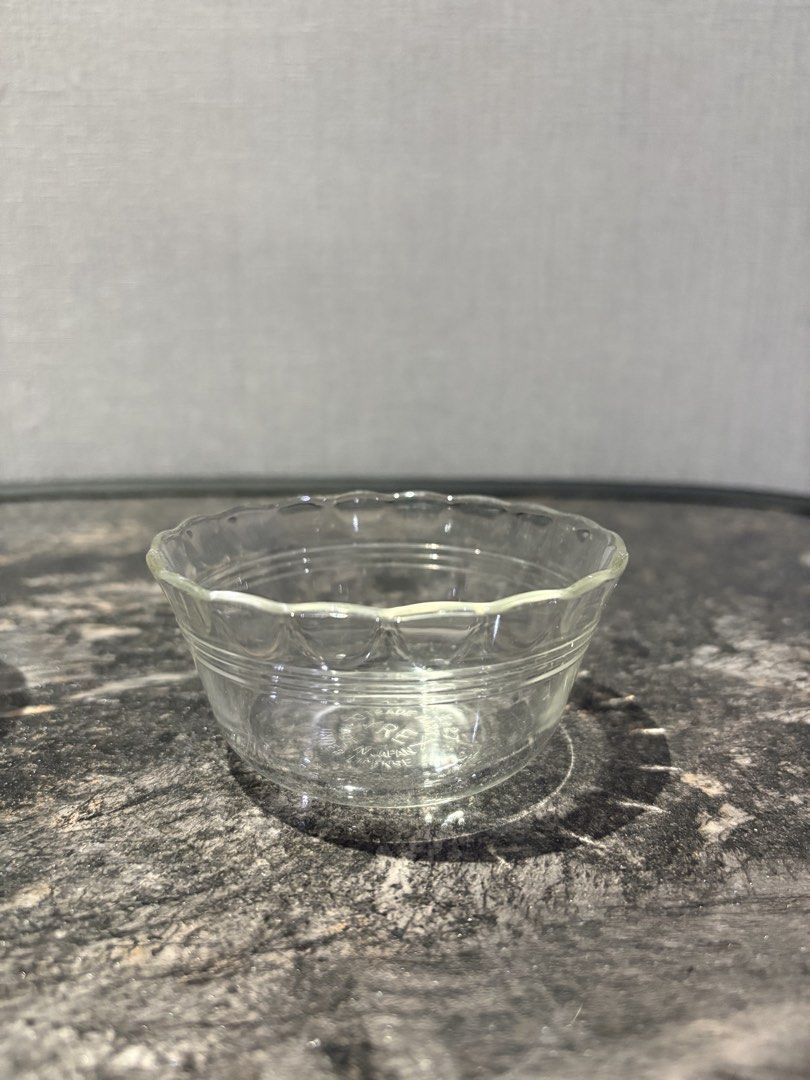 Pyrex Custard Cups (Category: Dinnerware & Cutlery) located in Manila. Submitted by foundhouseph (Listing ID 1465357594, Image 3). Description: - Pyrex custard cups -Qty. Available: 7 pcs -Price:50php each - Size: 3.5 x 2” - Made in Japan - Elegant design featuring scalloped rims and ribbed sides - Versatile size, perfect for serving snacks, dips, or desserts - Clear glass matches any table setting.