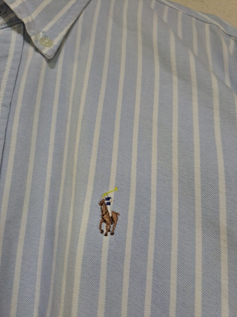 Ralph Lauren Custom Fit Striped Button Down (Category: Formal Shirts) located in Dumaguete. Submitted by jayarbajad49160 (Listing ID 1465284529, Image 3). Description: Ralph Lauren Custom Fit Striped Button Down Authentic/Original Excellent Condition Color rate:9.8/10 Issue: Last pic (Minimal only) Size XL Width:22 Length:29 Loc dumaguete city visayas.