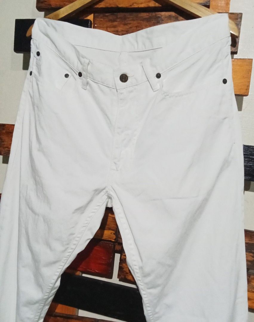 Ralph Lauren White Premium Jeans Pants (Category: Trousers) located in Caloocan City. Submitted by calmcat_6fd4f7 (Listing ID 1465175197, Image 3). Description: - Brand: Ralph Lauren - Color: Clean crisp white - Fit: Straight leg, traditional five-pocket setup - Size Details: 33 waist, 42 length, 8 hem - Details: Classic copper rivets with 'RL 67' branding - Material: Sturdy, high-quality denim - Condition: Excellent, versatile wardrobe staple.