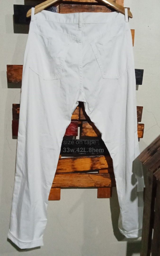 Ralph Lauren White Premium Jeans Pants (Category: Trousers) located in Caloocan City. Submitted by calmcat_6fd4f7 (Listing ID 1465175197, Image 2). Description: - Brand: Ralph Lauren - Color: Clean crisp white - Fit: Straight leg, traditional five-pocket setup - Size Details: 33 waist, 42 length, 8 hem - Details: Classic copper rivets with 'RL 67' branding - Material: Sturdy, high-quality denim - Condition: Excellent, versatile wardrobe staple.