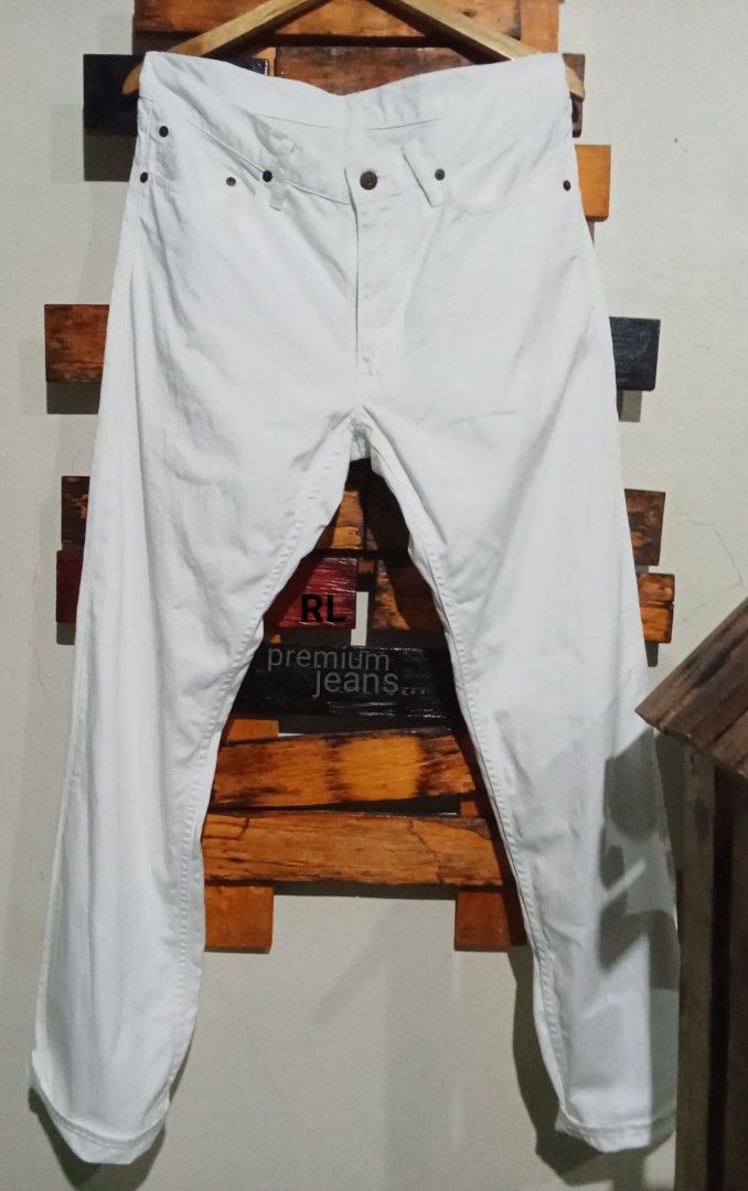 Ralph Lauren White Premium Jeans Pants (Category: Trousers) located in Caloocan City. Submitted by calmcat_6fd4f7 (Listing ID 1465175197, Image 1). Description: - Brand: Ralph Lauren - Color: Clean crisp white - Fit: Straight leg, traditional five-pocket setup - Size Details: 33 waist, 42 length, 8 hem - Details: Classic copper rivets with 'RL 67' branding - Material: Sturdy, high-quality denim - Condition: Excellent, versatile wardrobe staple.