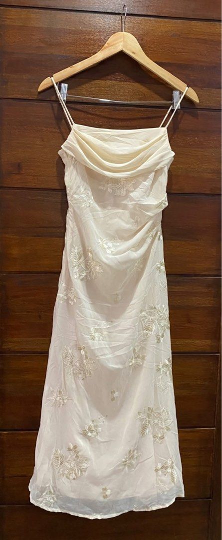 Rare y2k inspired achi utopia dress (Category: Dresses) located in Quezon City. Submitted by swift_kenjie (Listing ID 1465173259, Image 2). Description: 🤍✨ RARE Y2K-INSPIRED ACHI UTOPIA DRESS ✨🤍 Giving soft Y2K / vintage coquette princess vibes! 🎀 🌸 Achi Utopia 🌸 Size S 🌸 Ivory / Cream 🌸 Cowl neckline 🌸 Spaghetti straps 🌸 Beautiful floral + butterfly embroidery 🌸 Elegant flowy silhouette 🌸 Super feminine & dreamy when worn 🤍 The detai