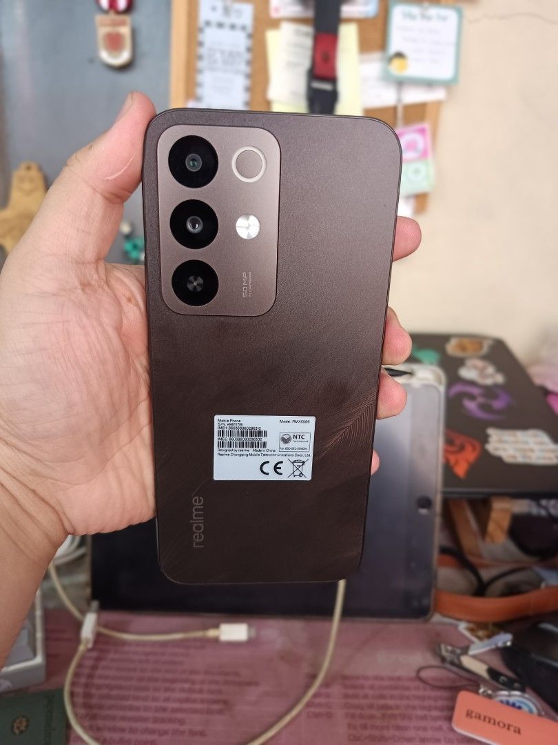 Realme c85 4g (Category: Realme) located in Caloocan City. Submitted by giancarlo.clase (Listing ID 1465378103, Image 2). Description: 3months old 128 gb storage 6gb +12gb RAM 7000mAh battery capacity waterproof 50mp rear camera 8mp fron camera Snapdragon685 processor.