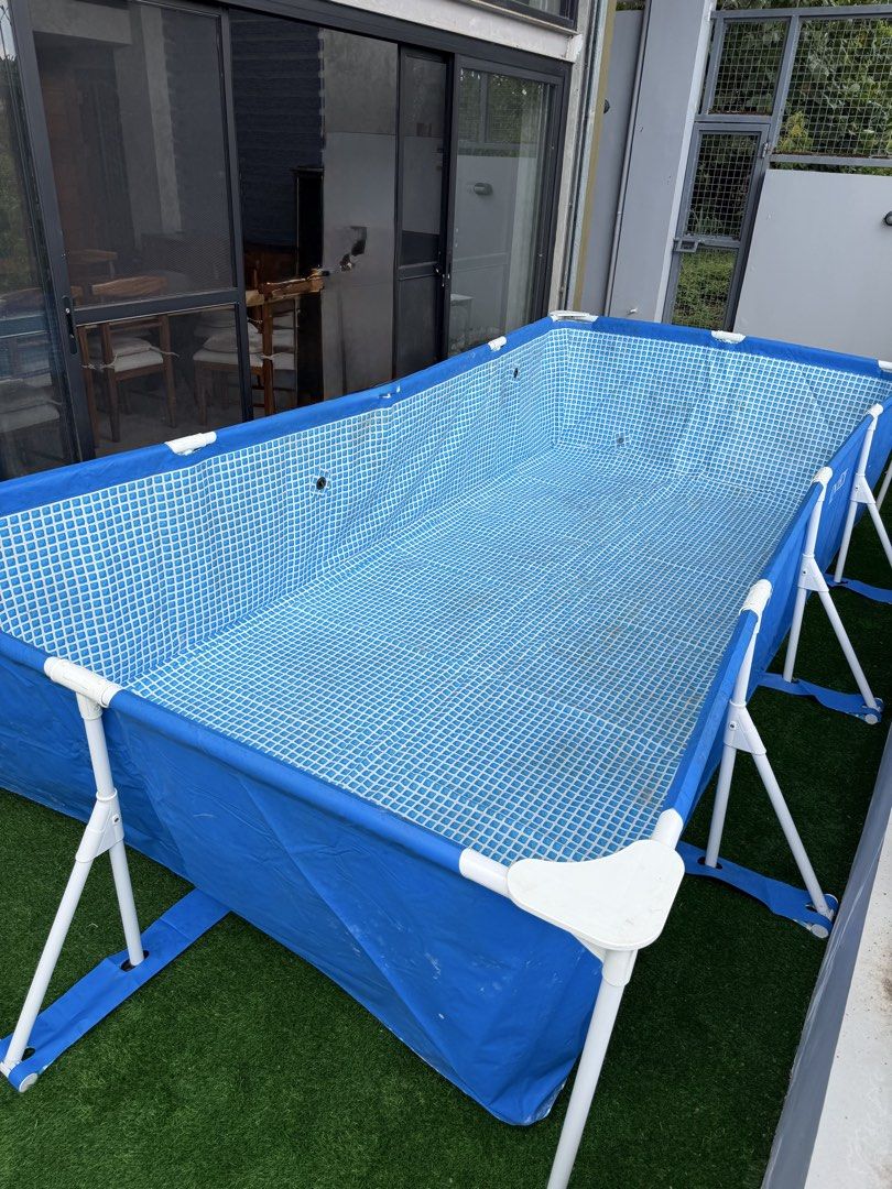 Rectangular Above Ground Frame Swimming Pool Blue White (Category: Water Sports) located in San Pedro. Submitted by maylynart09522 (Listing ID 1465329146, Image 1). Description: ￼INTEX® Rectangular Frame Pool, Ages 6+ (4.5m x 2.2m x 84cm) • used once • no box, nabasa kasi sa storage roomkaya nasira • good condition (needs cleaning, no butas) • complete parts ₱6,500 + shipping fee (originally purchased for approximately 10k) — price slightly negot