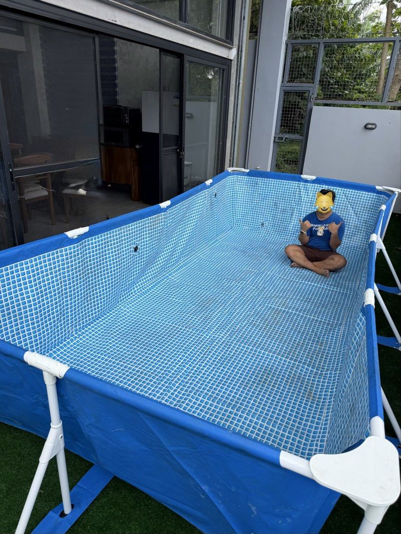 Rectangular Above Ground Frame Swimming Pool Blue White (Category: Water Sports) located in San Pedro. Submitted by maylynart09522 (Listing ID 1465329146, Image 3). Description: ￼INTEX® Rectangular Frame Pool, Ages 6+ (4.5m x 2.2m x 84cm) • used once • no box, nabasa kasi sa storage roomkaya nasira • good condition (needs cleaning, no butas) • complete parts ₱6,500 + shipping fee (originally purchased for approximately 10k) — price slightly negot