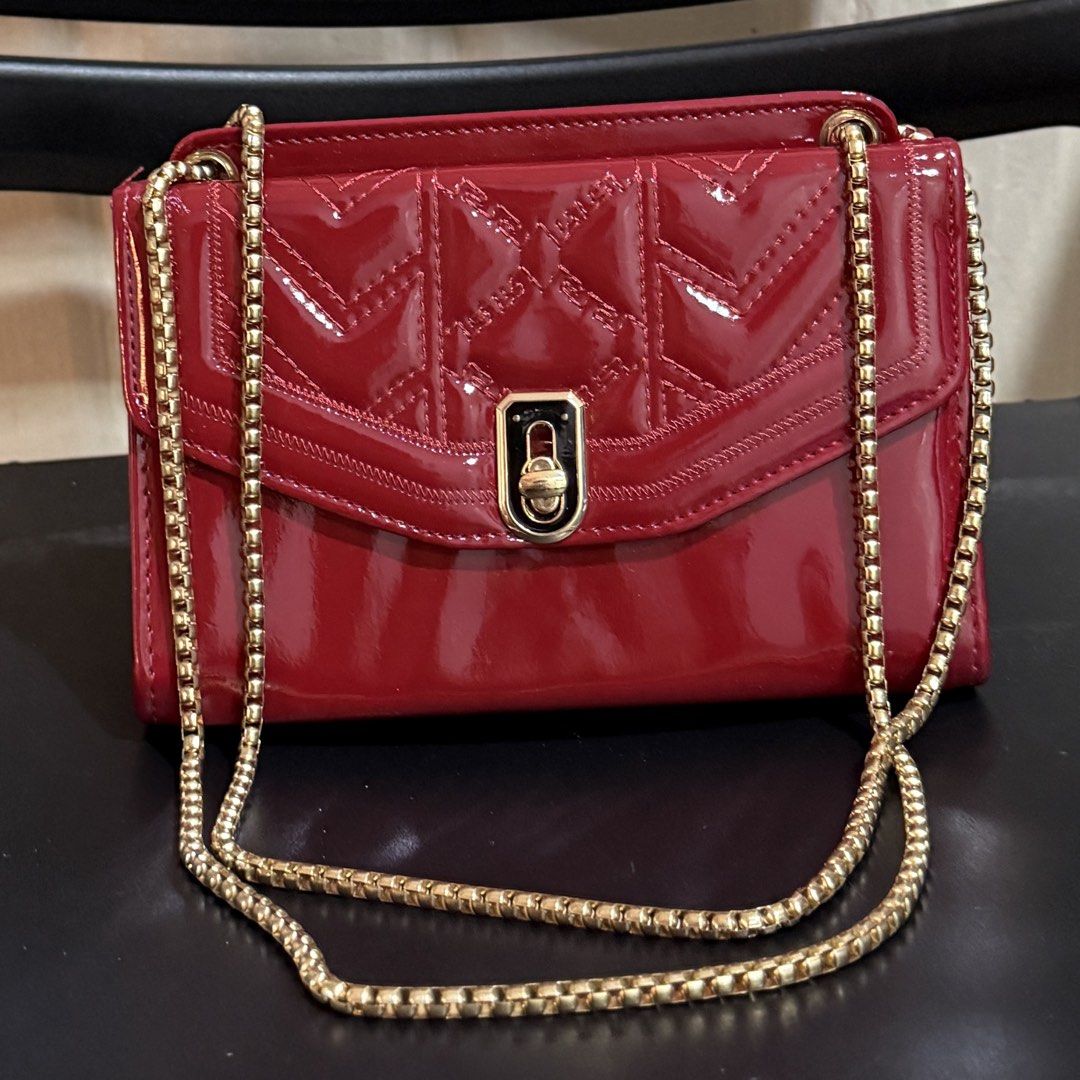 Red Adjustable Crossbody Bag with Gold Chain (Category: Cross-body Bags) located in Makati City. Submitted by julyco. (Listing ID 1465358857, Image 1). Description: - double flap - Eye-catching bright red patent leather with stylish quilted chevron front flap - Premium gold-tone hardware featuring a chic chunky chain strap - Secure and easy-to-use twist-lock front closure - Dark fabric-lined interior with multiple compartments to keep you organiz