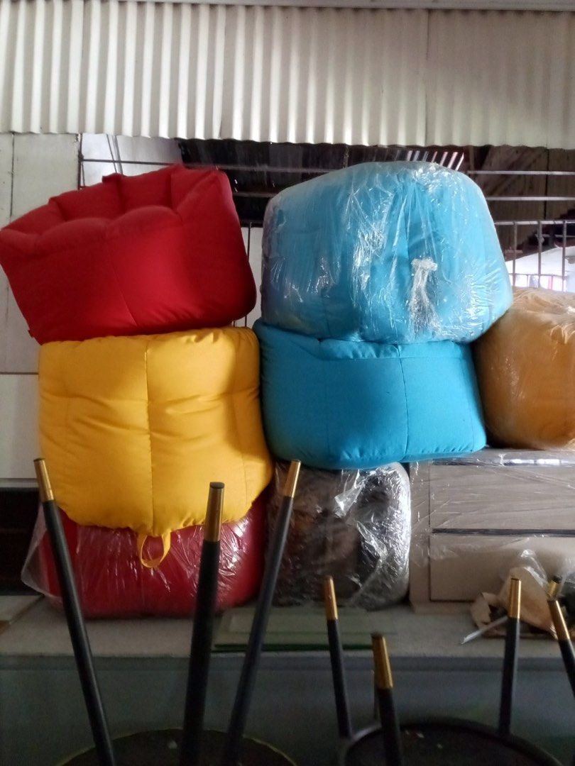 Red Bean Bag Chair Soft Lounge Seat (Category: Chairs) located in Makati City. Submitted by kdclueless (Listing ID 1465196341, Image 3). Description: - Color: 2 red 2 yellow 2 blue - Condition: Clean and durable fabric - Comfort: Stuffed full and very plush - Design: Deep bucket shape for great back support - Versatility: Perfect for living rooms, bedrooms, or reading nooks, and easy to move around.