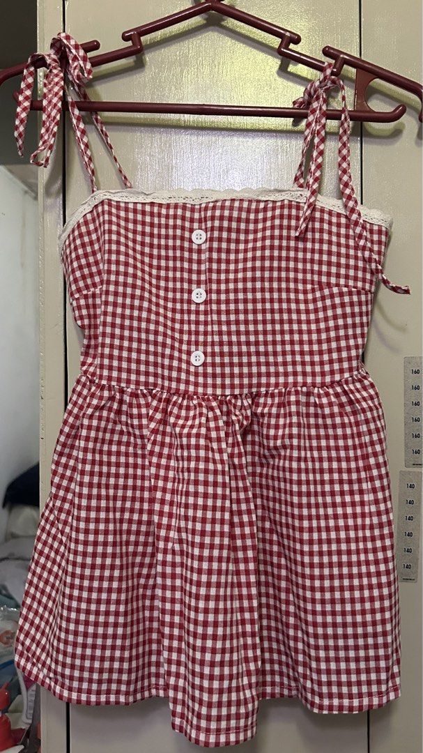 Red Casual Plaid Lace Button Tank Rop (Category: Sleeveless) located in Manila. Submitted by lueur000 (Listing ID 1465352304, Image 1). Description: Small Length - 44/17 Bust - 68/27 Stretchable.
