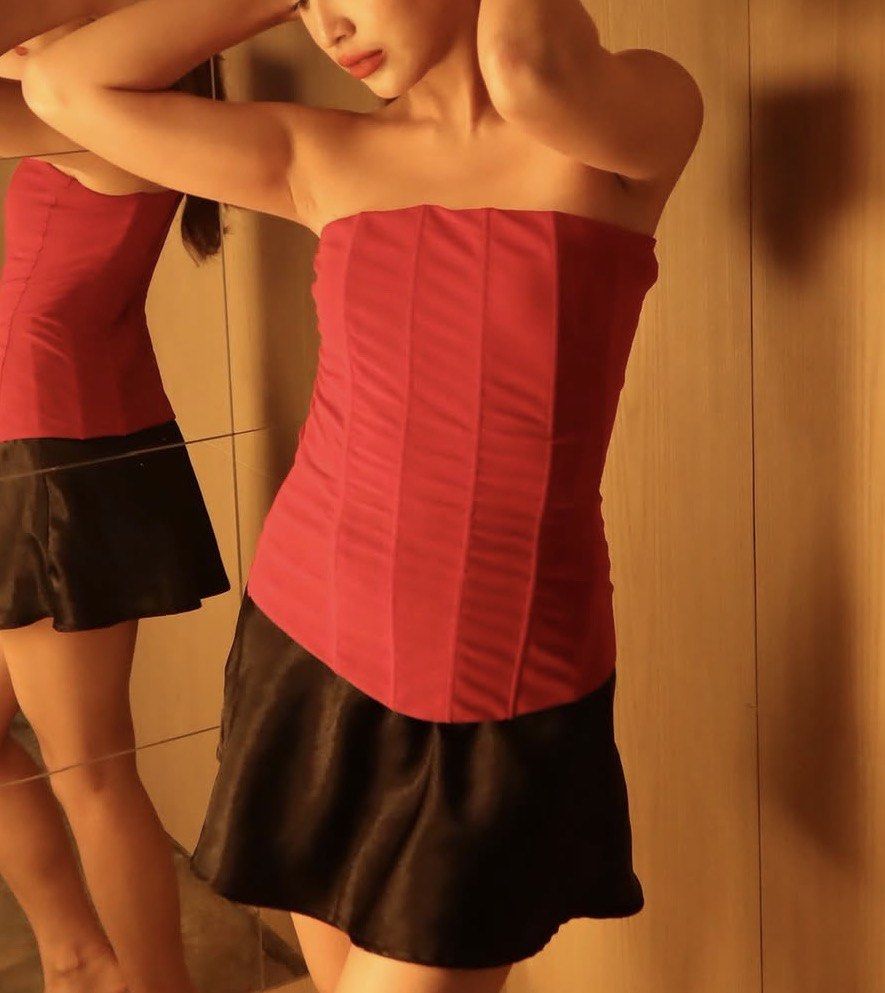 Red Strapless Corset Top (Category: Sleeveless) located in Cainta. Submitted by dyclutterxoxo (Listing ID 1465336437, Image 1). Description: - Color: Vibrant red - Style: Strapless corset top with structured all-over boning and a flattering fitted silhouette - Versatility: Perfect for pairing with high-waisted jeans, skirts, or trousers for parties and night outs - Condition: Worn just a couple of times, super clean, and well-kept - Environment: 