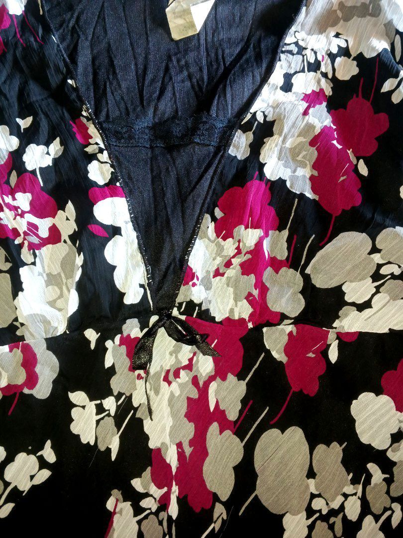 Reilmann (Category: Luxury Apparel) located in Manila. Submitted by icamalicdem29 (Listing ID 1465266110, Image 3). Description: Reilmann vintage Y2K babydoll blouse, featuring a sheer chiffon overlay with a bold floral print in black, white, and hot pink. It is.