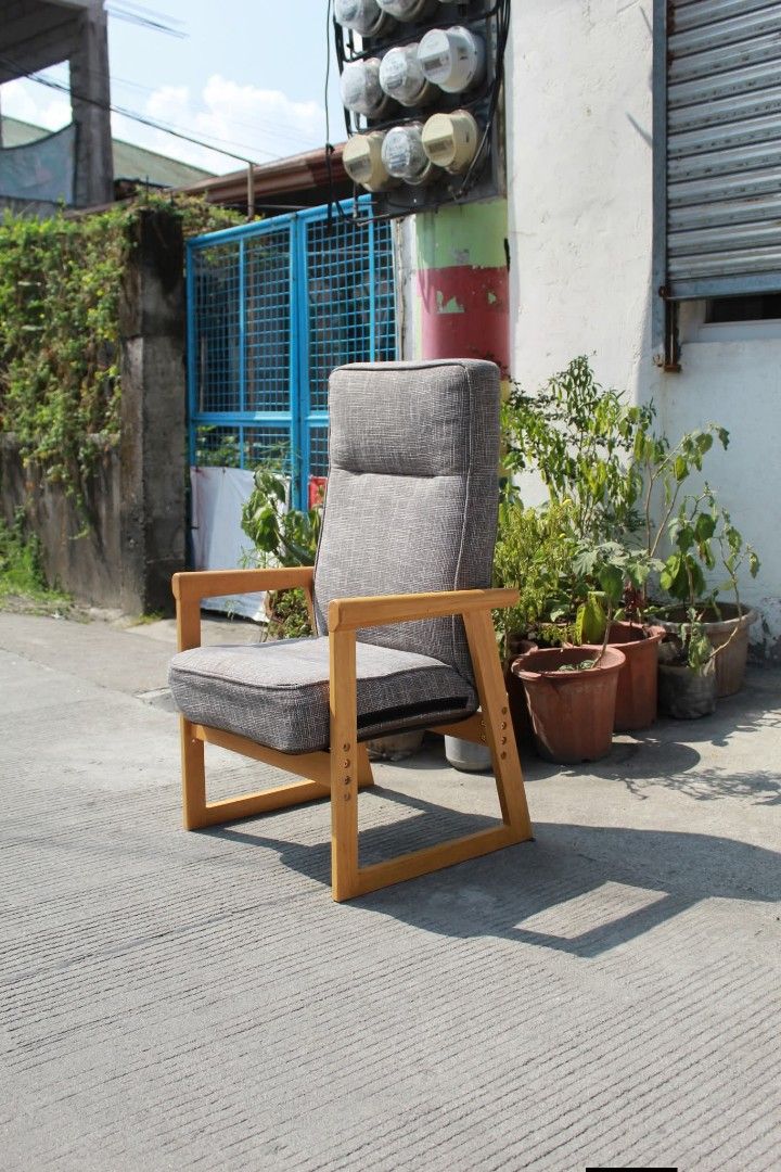 Relaxing Chair (Category: Chairs) located in Meycauayan. Submitted by marygracecasimiro (Listing ID 1465381348, Image 2). Description: Adjustable High-Back Recliner Chair Thick charcoal gray fabric upholstery, natural wood frame, adjustable seat height and reclining backrest. Designed for comfortable sitting and easy standing, perfect for living rooms, reading areas or relaxation spaces L:21 ¾ • W:21 • Seat H:16 • Back H:39 inches 6,000 pesos onl