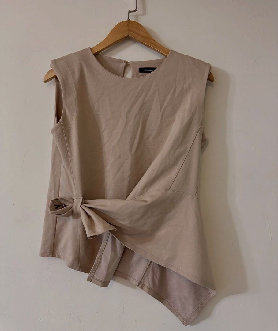 Rice Apricot Asymmetrical Design Top (Category: Sleeveless) located in Tayug. Submitted by deklutter_ (Listing ID 1465287961, Image 2). Description: Padded shoulders Thick comfy fabric GANDA Fits MEDIUM No issues, just needs plantsa ‼️Pls haggle responsibly. All items are priced according to their overall condition..