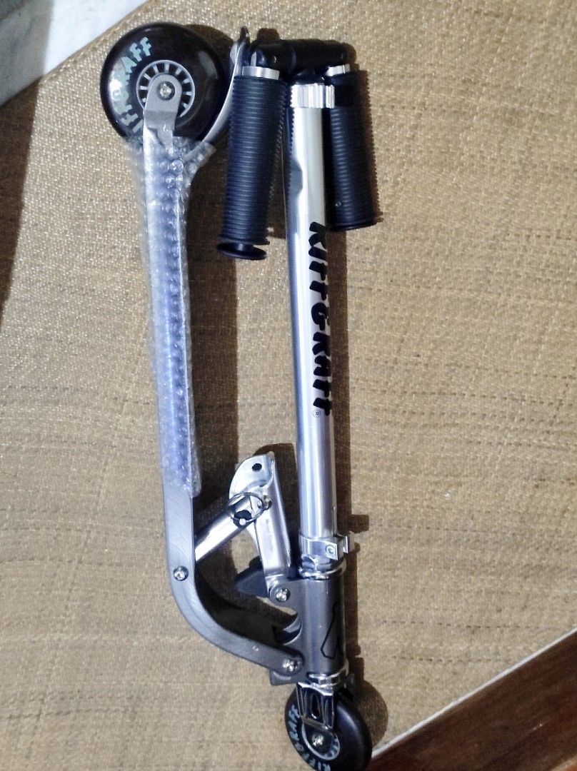Collectible Riff Raff Foldable Kick Scooter with Box (Category: Skates, Rollerblades & Scooters) located in Cavite. Submitted by noblepenguin_6c8662 (Listing ID 1465174577, Image 2). Description: - Brand: Riff Raff -Vintage Kick Scooter - Condition: Brand new, unused, and safely stored - Colorway: Sleek silver and black - Design: Foldable for easy storage and transport - Features: Textured handlebar grips and sturdy wheels - Inclusions: Comes wit