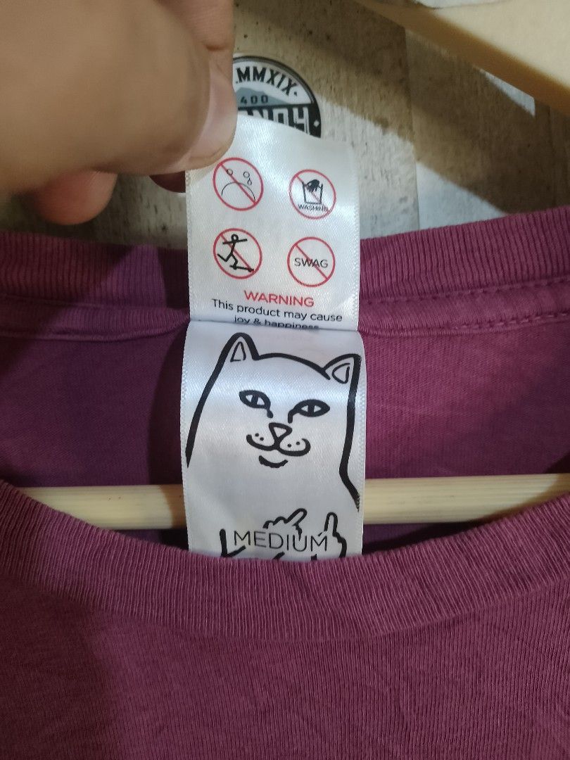 Ripndip Lord Nermal Pocket T-Shirt Maroon Medium (Category: Tshirts & Polo Shirts ) located in Naga. Submitted by neppyboy (Listing ID 1465381076, Image 3). Description: - Brand: Ripndip - Color: Maroon - Size: Medium - Fit: Standard fit - Material: Comfortable cotton - Features: Short sleeves, crew neck, and chest pocket with the iconic Lord Nermal middle finger peek graphic.