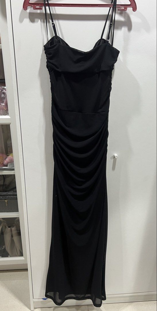 Ruby Sees Black Ruched Maxi Dress Size 10 (Category: Dresses) located in Taguig. Submitted by strutstella (Listing ID 1465217593, Image 3). Description: - Brand: Ruby Sue - Size: 10 - Condition: Brand new with tags (BNWT), never worn - Color: Black - Style: Straight neckline with thin adjustable straps and full-body ruched texture - Length: Midi-to-maxi - Perfect for: Night outs, parties, and special events Small to medium best fit Will fit up to