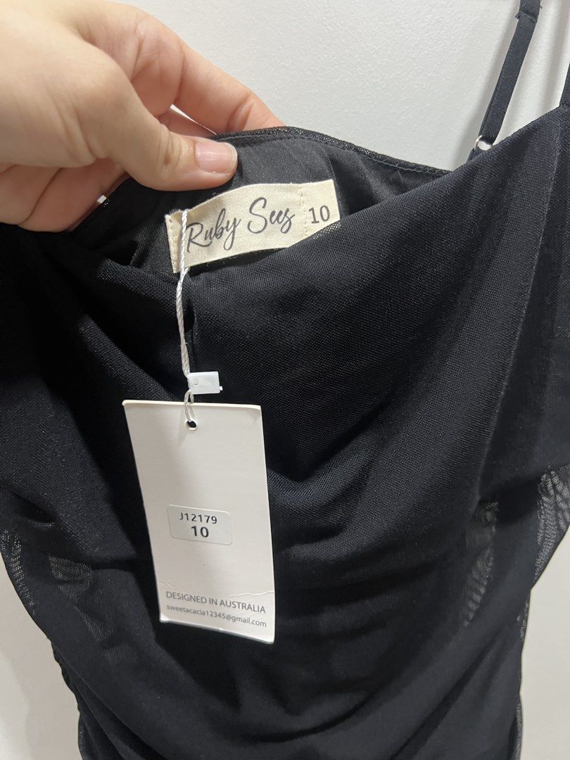 Ruby Sees Black Ruched Maxi Dress Size 10 (Category: Dresses) located in Taguig. Submitted by strutstella (Listing ID 1465217593, Image 2). Description: - Brand: Ruby Sue - Size: 10 - Condition: Brand new with tags (BNWT), never worn - Color: Black - Style: Straight neckline with thin adjustable straps and full-body ruched texture - Length: Midi-to-maxi - Perfect for: Night outs, parties, and special events Small to medium best fit Will fit up to