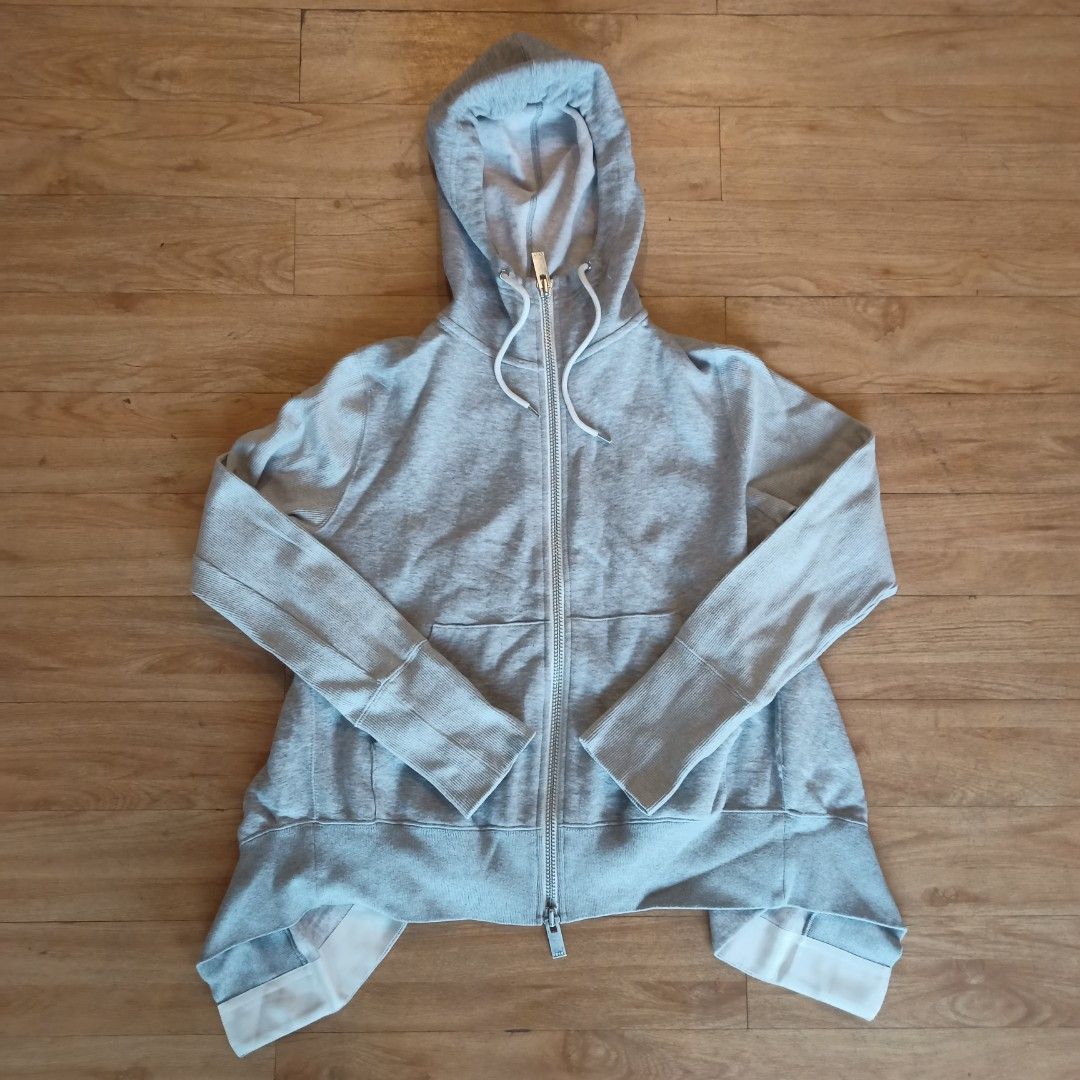 Sacai asymmetrical hoodie (Category: Coats, Jackets and Outerwear) located in Cavite. Submitted by blasterr21 (Listing ID 1465268642, Image 1). Description: sacai asymmetrical hoodie size 1 on tag fits medium-large very good condition no major flaws authentic ptp: 20 inches length: 24 inches sleeve length: 24 inches.