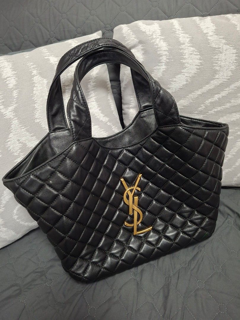 Saint Laurent Black Quilted Leather Shoulder Bag (Category: Luxury Bags & Wallets) located in Quezon City. Submitted by stahliagallore (Listing ID 1465287175, Image 3). Description: - YSL Genuine Leather, bought from a reliable China Seller Pasabuy - Material: Soft black quilted - Hardware: Iconic gold-tone YSL logo and clean hardware - Straps: Convenient double handle strap - Interior: Spacious fabric lining with a secure zip pocket - Inclusions