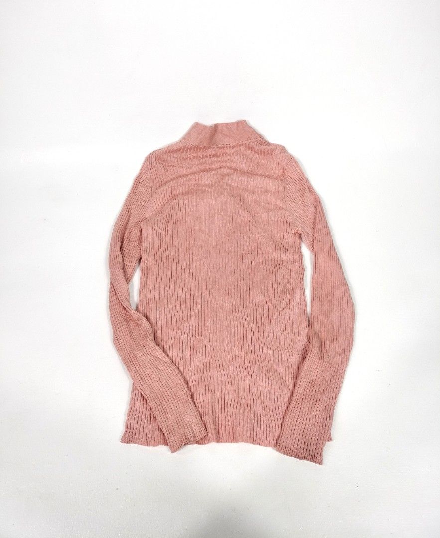 Sandro Paris Pink Ribbed Knit Cardigan (Category: Coats, Jackets and Outerwear) located in Manila. Submitted by callmetin (Listing ID 1465296431, Image 2). Description: Condition : Verygood Size : 3 Dimension 👇 Chest : 15-23 Lenght : 24 Shoulder : 12-17 Sleeve : 22 - Brand: Sandro Paris - Color: Light pink - Material: Fine ribbed knit texture - Design: Shawl collar neckline, signature white logo buttons, long sleeves with fitted cuffs - Conditio