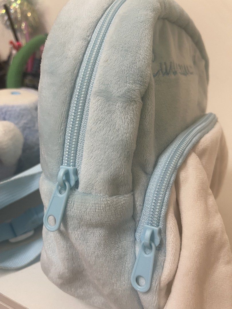 Sanrio Cinnamoroll Mini Backpack with Plushie (Category: Babies & Kids Fashion) located in San Juan City. Submitted by marthina.jacobo (Listing ID 1465178921, Image 3). Description: Backpack and plushie Issue: detached glued ear on the bag (see last photo) Needs cleaning RFS: Decluttering Actual color may slightly vary due to lighting ₱120 + sf Modes of payment are through Unionbank/Metrobank/ GoTyme/ GCash.