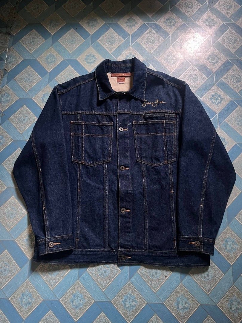 Sean John Denim Jacket (Category: Coats, Jackets and Outerwear) located in Manila. Submitted by 7rosemar70127 (Listing ID 1465198656, Image 1). Description: SEAN JOHN DENIM JACKET -MADE IN PHILIPPINES -HARD DENIM -LARGE ON TAG GOOD CONDITION DIMENSIONS: WIDTH: 23" LENGTH: 29.5" ISSUE/FLAWS -SEE LAST PIC.