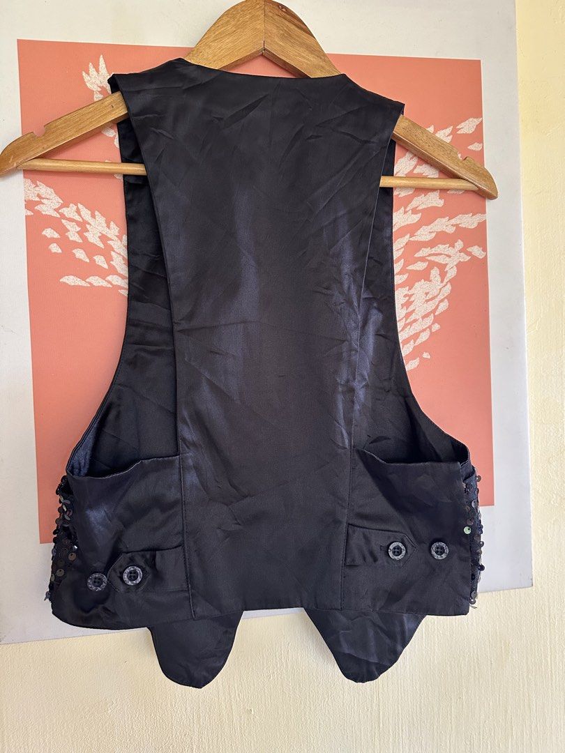 sequin black vest M-SeminL (Category: Sleeveless) located in Calapan. Submitted by shakalak (Listing ID 1465226984, Image 2). Description: - Brand/Origin: yoyos cloth korea - Design: Black vest with shiny sequins on the front and smooth satin on the back - Features: V-neck, sleeveless, two functional pockets, and back button adjustment tabs - Style: Great for parties, stage wear, or elevating casual fits - Condition: Excellent, ready to wear.