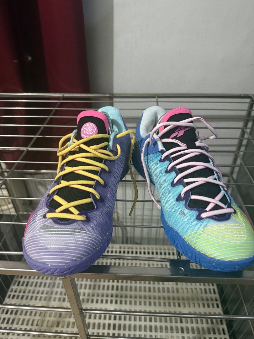 Serious Player Only player 1.5 (Category: Sneakers) located in Pasay City. Submitted by ellianapenelope (Listing ID 1465336252, Image 1). Description: Weartesters basketball shoes in a mismatch multicolour setup. Left shoe goes in blue, pink, and yellow. Right shoe rocks purple, teal, and gold tones. Unique text printed on the heel counters. Includes shoe trees inside to keep the shape. Great grip on the rubber outsoles with splatter details. Gra
