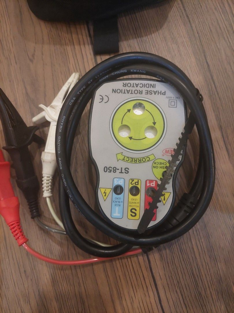 SEW ST-850 Phase Rotation Indicator (Category: Construction Tools & Equipment) located in Manila. Submitted by nobleocean.8abc26 (Listing ID 1465376731, Image 1). Description: - Model: SEW ST-850 Phase Rotation Indicator - Includes attached heavy-duty black cables - Comes with red and white leads featuring insulated alligator clips - Clear faceplate with rotation check indicators and terminal markings (P1, P2, P3) - Condition: Normal signs of pre