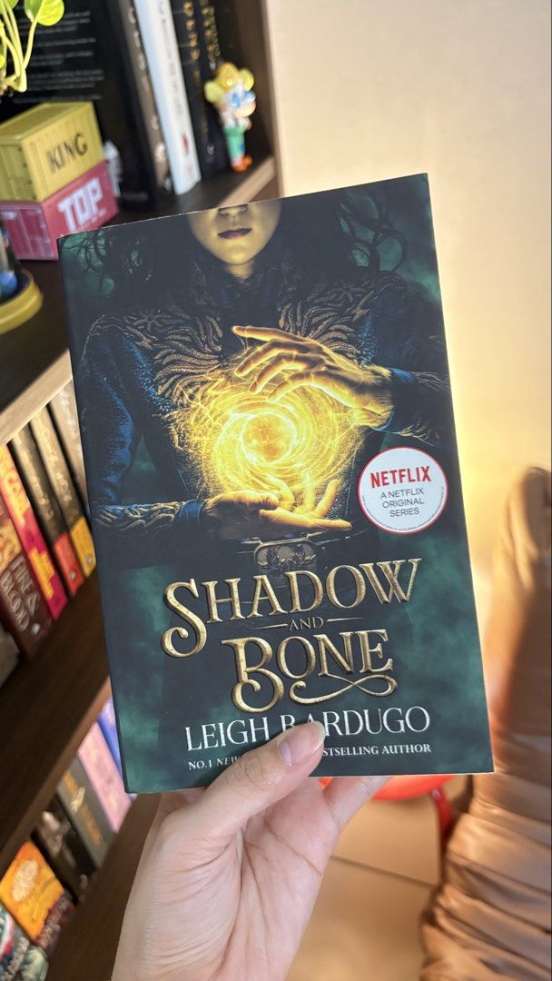 SHADOW AND BONE by Leigh Bardugo (Category: Storybooks) located in Makati City. Submitted by ericka_cb (Listing ID 1465315884, Image 1). Description: Genre: YA Fantasy Adventure Condition: Clean pages, no spine creases, has foxing and tanned edges.