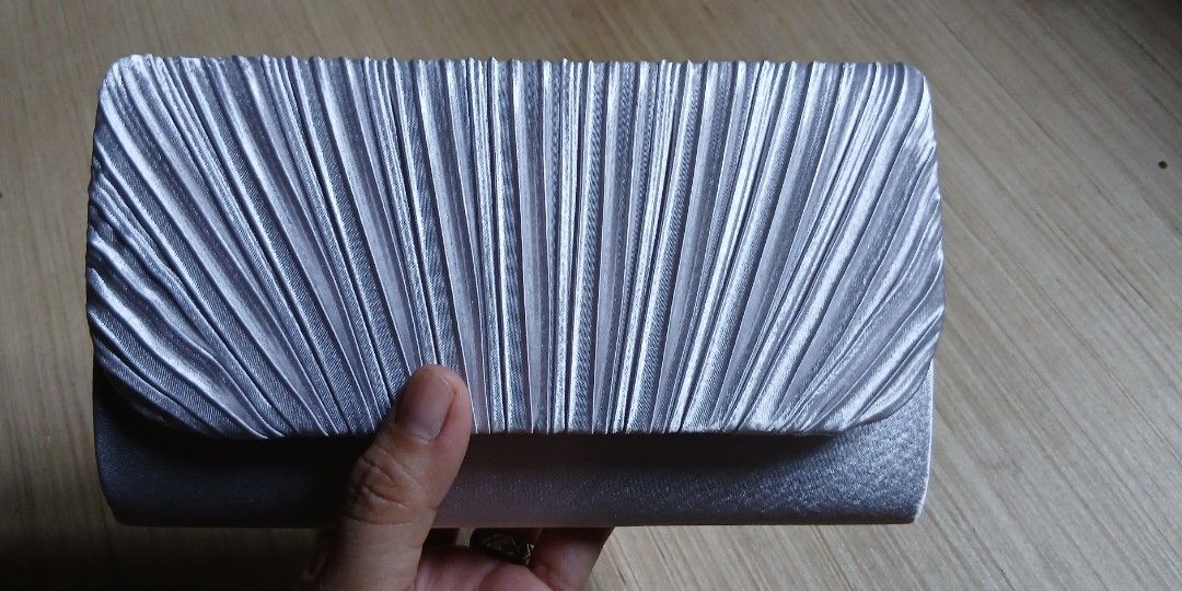Silver party bag (Category: Purses & Pouches) located in Manila. Submitted by shoppebymaria (Listing ID 1465237660, Image 1). Description: once used..
