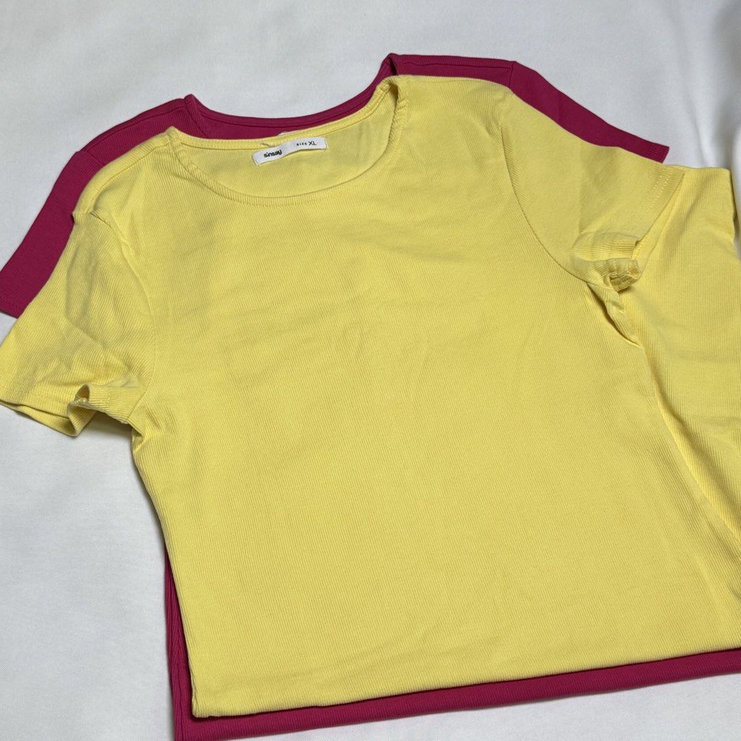 Sinsay Ribbed T-Shirt Bundle Size XL (Category: Shirts) located in Santa Rosa. Submitted by kym_11 (Listing ID 1465332418, Image 2). Description: - Brand: Sinsay - Size: XL on tag (xs-l) - Quantity: 2 pieces (Bundle pair) - Colors: Barbie pink and pastel yellow - Style: Short sleeve, round neckline - Material: Stretchy, comfortable ribbed fabric - Condition: Great for everyday casual wear.