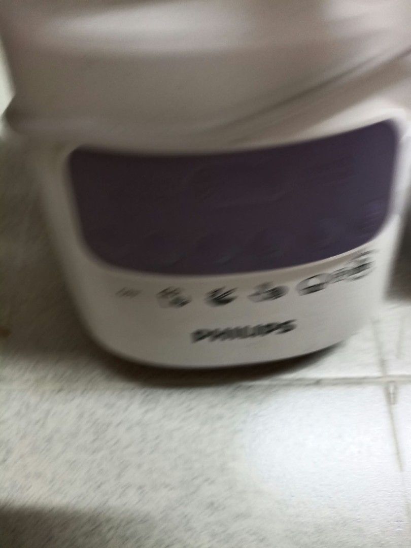 SKG Bread Maker Automatic Bread Machine (Category: Breadmakers) located in Singapore. Submitted by wintermanz (Listing ID 1465334031, Image 2). Description: - Brand: SKG Automatic Bread Maker - Color: White body with sleek stainless steel top lid and viewing window - Capacity: Adjustable weight options for 500g, 750g, and 1000g loaves - Versatile Settings: Includes rice bread, gluten-free, dessert, mix, dough, knead, cake, jam, yogurt, and bake -