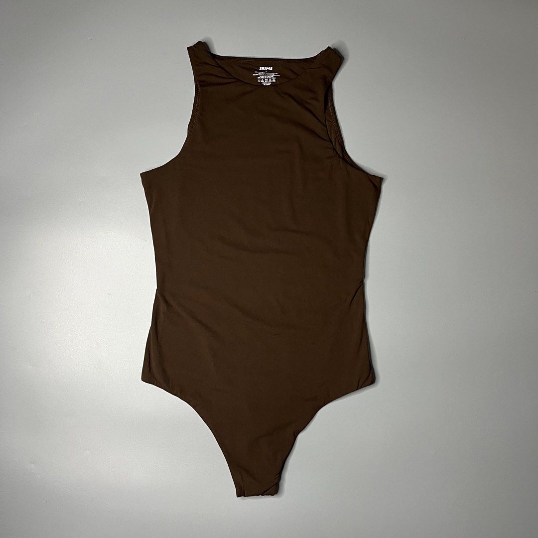 SKIMS HIGH NECK BODY SUIT (Category: Undergarments & Loungewear) located in Manila. Submitted by aaaaaahhhhhh (Listing ID 1465306664, Image 1). Description: Small 13W 24L Minimal lints Lalamove or J&t Express + Shipping fee.