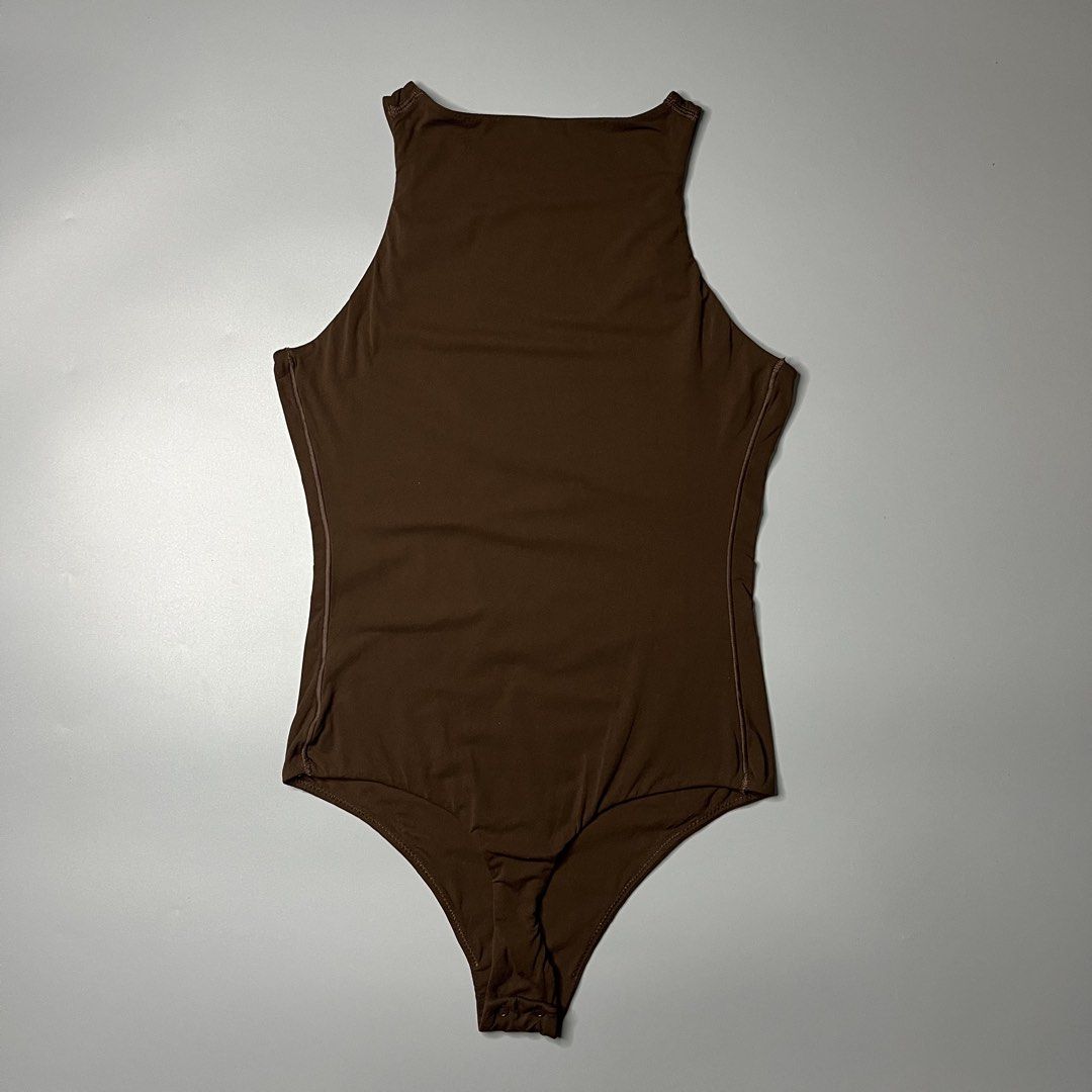 SKIMS HIGH NECK BODY SUIT (Category: Undergarments & Loungewear) located in Manila. Submitted by aaaaaahhhhhh (Listing ID 1465306664, Image 2). Description: Small 13W 24L Minimal lints Lalamove or J&t Express + Shipping fee.