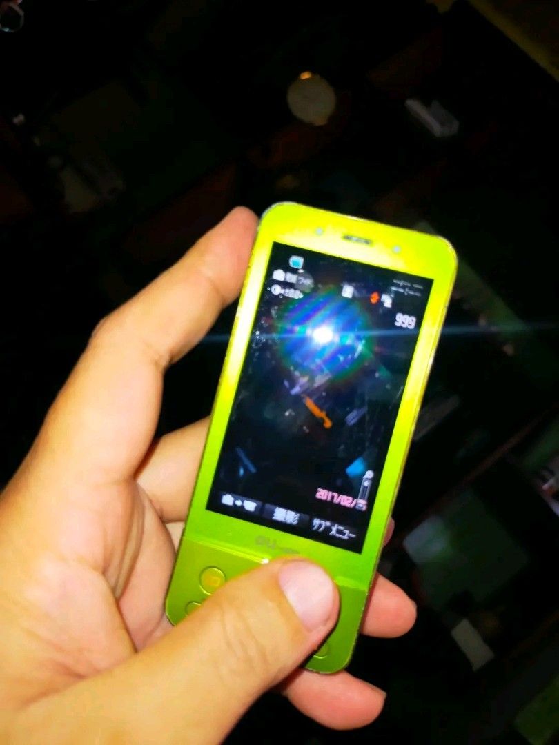 Slide-Up Phone (Category: Other Gadgets) located in Manila. Submitted by elilee_80 (Listing ID 1465352679, Image 3). Description: FOR SALE! KYOCERA KDDi (Slide-Up Phone) Yellow Green 8 MP CAMERA With Flash (DIGICAM Alternative) With 4gig MICRO SD/ CLIP CHARGER ISSUE: Hindi pa Open-line/ OK Button Di gumagana! Imported and made in japan In good working condition AS-IS! 1,500php PAYMENT: Gcash/Cebuana SHIPPING: LBC/ J&T PICKUP: Lalamove/Grab/Mr.Spe