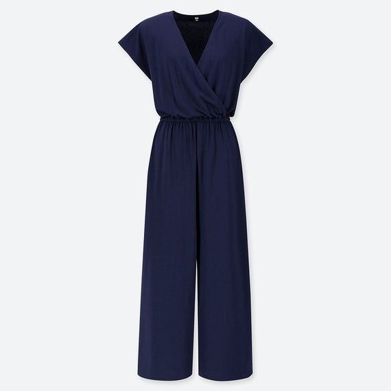 Small Uniqlo Wrap Style All in One (Category: Jumpsuits) located in Castillejos. Submitted by lalainecloset22 (Listing ID 1465244611, Image 2). Description: - Brand: Uniqlo - Style: Wrap Style All-In-One Jumpsuit with wide-leg pants - Size: S (EU 36 / UK 8 / US 4) - Color: Navy Blue - Features: V-neck wrap front, elasticized waist for easy fit, lightweight and soft fabric - Condition: Excellent pre-loved condition, well-maintained.