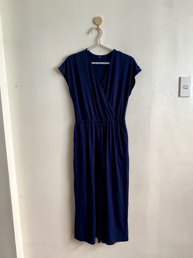 Small Uniqlo Wrap Style All in One (Category: Jumpsuits) located in Castillejos. Submitted by lalainecloset22 (Listing ID 1465244611, Image 3). Description: - Brand: Uniqlo - Style: Wrap Style All-In-One Jumpsuit with wide-leg pants - Size: S (EU 36 / UK 8 / US 4) - Color: Navy Blue - Features: V-neck wrap front, elasticized waist for easy fit, lightweight and soft fabric - Condition: Excellent pre-loved condition, well-maintained.