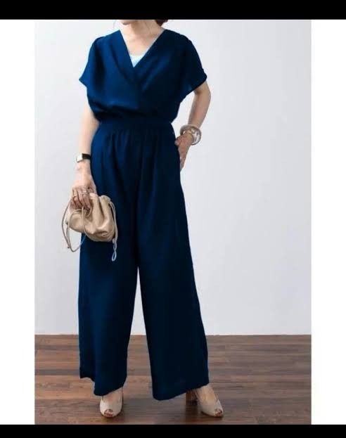 Small Uniqlo Wrap Style All in One (Category: Jumpsuits) located in Castillejos. Submitted by lalainecloset22 (Listing ID 1465244611, Image 1). Description: - Brand: Uniqlo - Style: Wrap Style All-In-One Jumpsuit with wide-leg pants - Size: S (EU 36 / UK 8 / US 4) - Color: Navy Blue - Features: V-neck wrap front, elasticized waist for easy fit, lightweight and soft fabric - Condition: Excellent pre-loved condition, well-maintained.