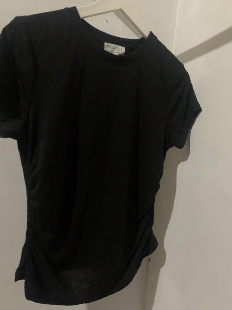 Sofía Jeans by Sofía Vergara Black Tee (Category: Shirts) located in Manila. Submitted by spaceshop12345 (Listing ID 1465309433, Image 2). Description: - Brand: Sofía Jeans by Sofía Vergara - Color: Classic black - Style: Short-sleeve crewneck tee - Fit: Classic fit with a round neckline - Fabric: Super soft and comfortable - Condition: Clean and ready to wear - Versatile: Easy to pair with jeans or skirts.