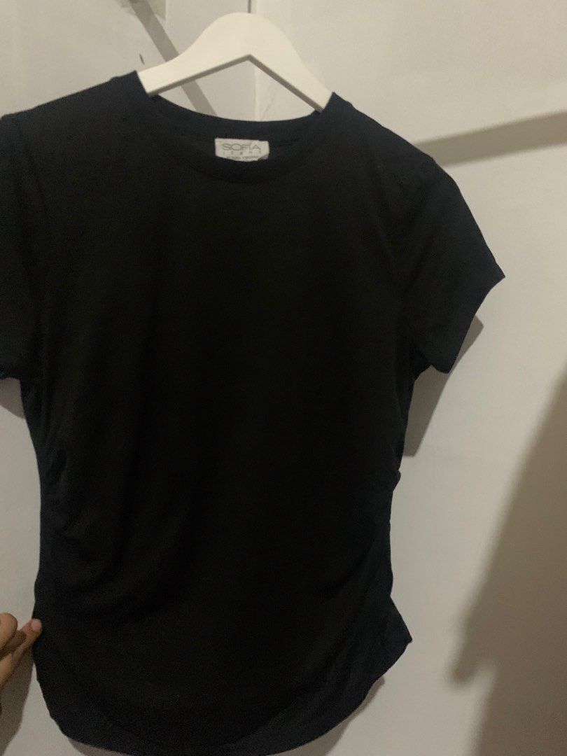 Sofía Jeans by Sofía Vergara Black Tee (Category: Shirts) located in Manila. Submitted by spaceshop12345 (Listing ID 1465309433, Image 1). Description: - Brand: Sofía Jeans by Sofía Vergara - Color: Classic black - Style: Short-sleeve crewneck tee - Fit: Classic fit with a round neckline - Fabric: Super soft and comfortable - Condition: Clean and ready to wear - Versatile: Easy to pair with jeans or skirts.