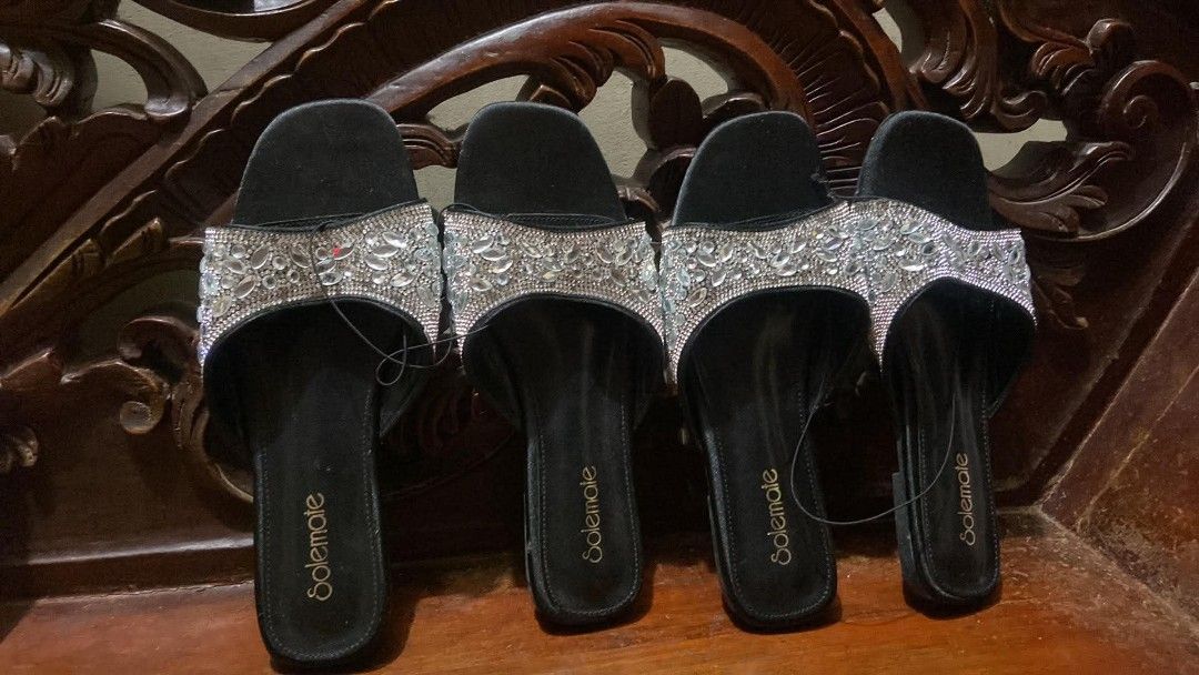 Solemate Black Rhinestone Slip-On Sandals (Category: Flats & Sandals) located in Manila. Submitted by crustynico (Listing ID 1465381597, Image 1). Description: - Brand: Solemate - Style: Slip-on sandals with square toe - Condition: Brand new with plastic tags attached, never worn - Details: Wide front strap covered in sparkling rhinestones and crystals, gold logo lettering on footbed - Perfect for: Parties, events, or elevating casual everyday ou