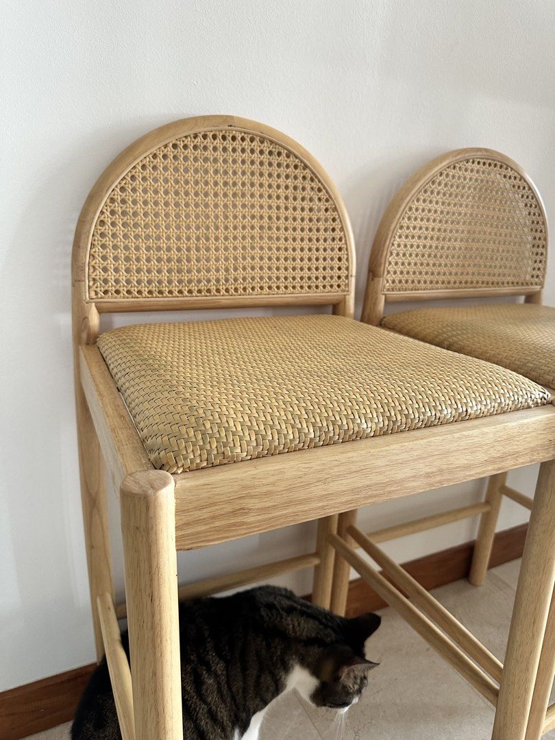 Solid Wood Bar Stools (Category: Chairs) located in Singapore. Submitted by zeesells123 (Listing ID 1465254682, Image 3). Description: - Set of 2 solid wooden bar stools - Natural light wood finish - Woven rattan seats & arched cane backs - Very aesthetic and strong - Sitting height 65-67cm. - $90 for each chair. Must buy as a pair. .