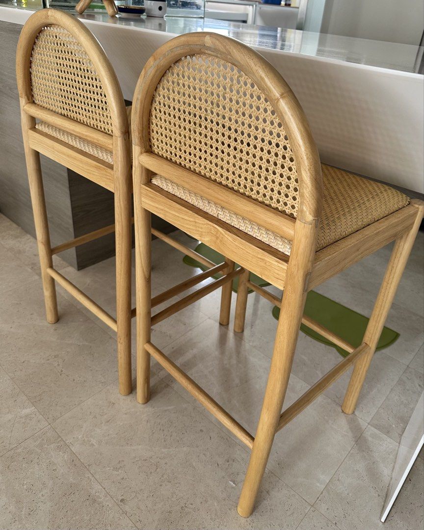 Solid Wood Bar Stools (Category: Chairs) located in Singapore. Submitted by zeesells123 (Listing ID 1465254682, Image 1). Description: - Set of 2 solid wooden bar stools - Natural light wood finish - Woven rattan seats & arched cane backs - Very aesthetic and strong - Sitting height 65-67cm. - $90 for each chair. Must buy as a pair. .