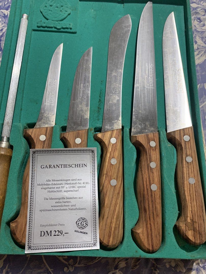 Solingen German Knife Set with Sharpening Steel and Case (Category: Knives & Chopping Boards) located in Manila. Submitted by vrsd1027 (Listing ID 1465266005, Image 1). Description: - Genuine Solingen kitchen knife set crafted in Germany - Includes 5 versatile blades made of high-quality Molybdän-Edelstahl steel - Comes with a matching sharpening steel to keep blades razor-sharp - Durable, water-resistant natural wood handles for a comfortable gr