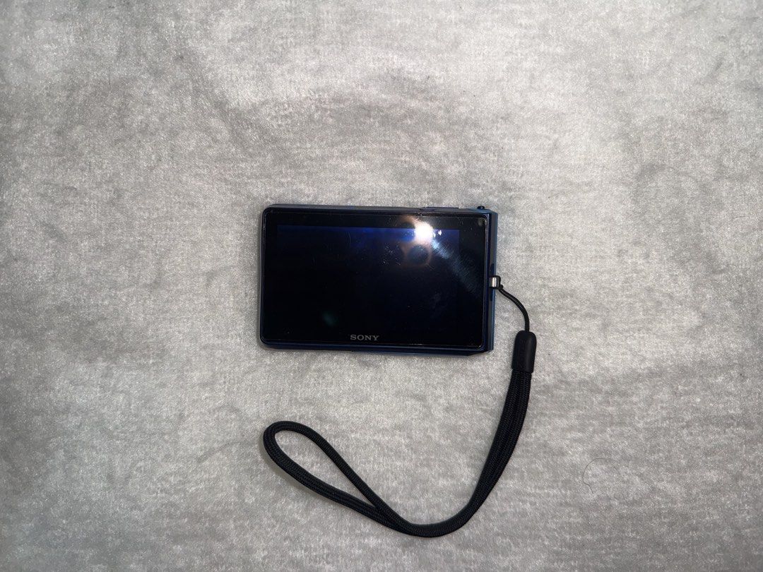 Sony Cyber-shot DSC-TX30 Blue Digital Camera (Category: Cameras) located in Manila. Submitted by jlcabangs (Listing ID 1465380233, Image 2). Description: - Model: Sony Cyber-shot DSC-TX30 Pocket Camera (Blue) - Resolution & Lens: 18.2 Megapixels with Carl Zeiss lens - Durability: Waterproof body, perfect for underwater and travel shots - Condition: Compact metal casing with minor scuff marks near the top edge from normal handling - Storage: Uses 
