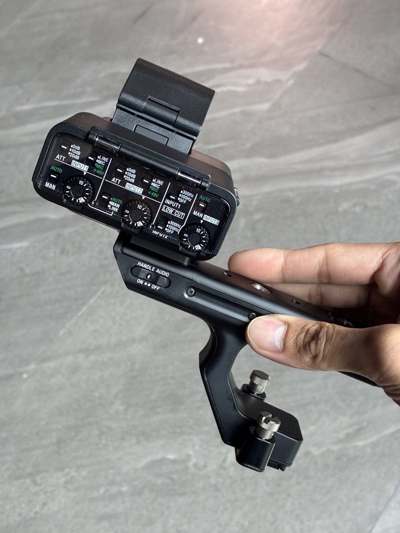 Sony XLR-H1 Handle Unit (FX3 / FX30) (Category: Video Cameras) located in Makati City. Submitted by spiciemeatbal (Listing ID 1465217339, Image 2). Description: Brand new, never used. Came with my FX3. • 2x XLR/TRS combo inputs with +48V • 3.5mm INPUT3 • Level dials, ATT, low cut per channel • Mic holder + rod clamp included Condition 10/10 Makati pickup, meetup and test welcome..