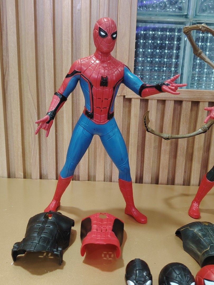SPIDER-MAN (Category: Action & Battle Toys) located in Baguio. Submitted by ezelmix94436 (Listing ID 1465183620, Image 3). Description: - Includes 2 Spider-Man action figures with great height and articulation - Comes with multiple interchangeable heads and movie suit options - Equipped with chest armor pieces and mechanical back arms - Includes web effects and extra gear for mixing and matching - Perfect customizable setup for fans and collector