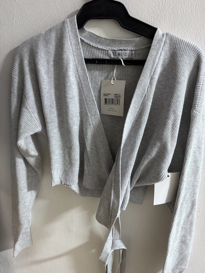 Cropped knit tie cardigan BNew Australian brand (Category: Longsleeves) located in Makati City. Submitted by officegirl888 (Listing ID 1465328497, Image 3). Description: Brand new tie cardigan For pick up in Salcedo Village Makati .
