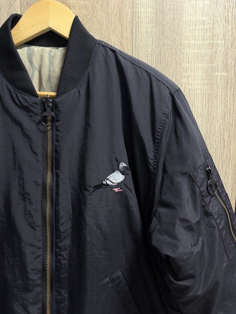 Staple Bomber Reversible Jacket Patchwork (Category: Coats, Jackets and Outerwear) located in Imus. Submitted by rckrmns (Listing ID 1465342468, Image 3). Description: Staple Bomber Reversible Jacket Patchwork Nature Print Size M W- 23 L- 27 Good as new no issues.