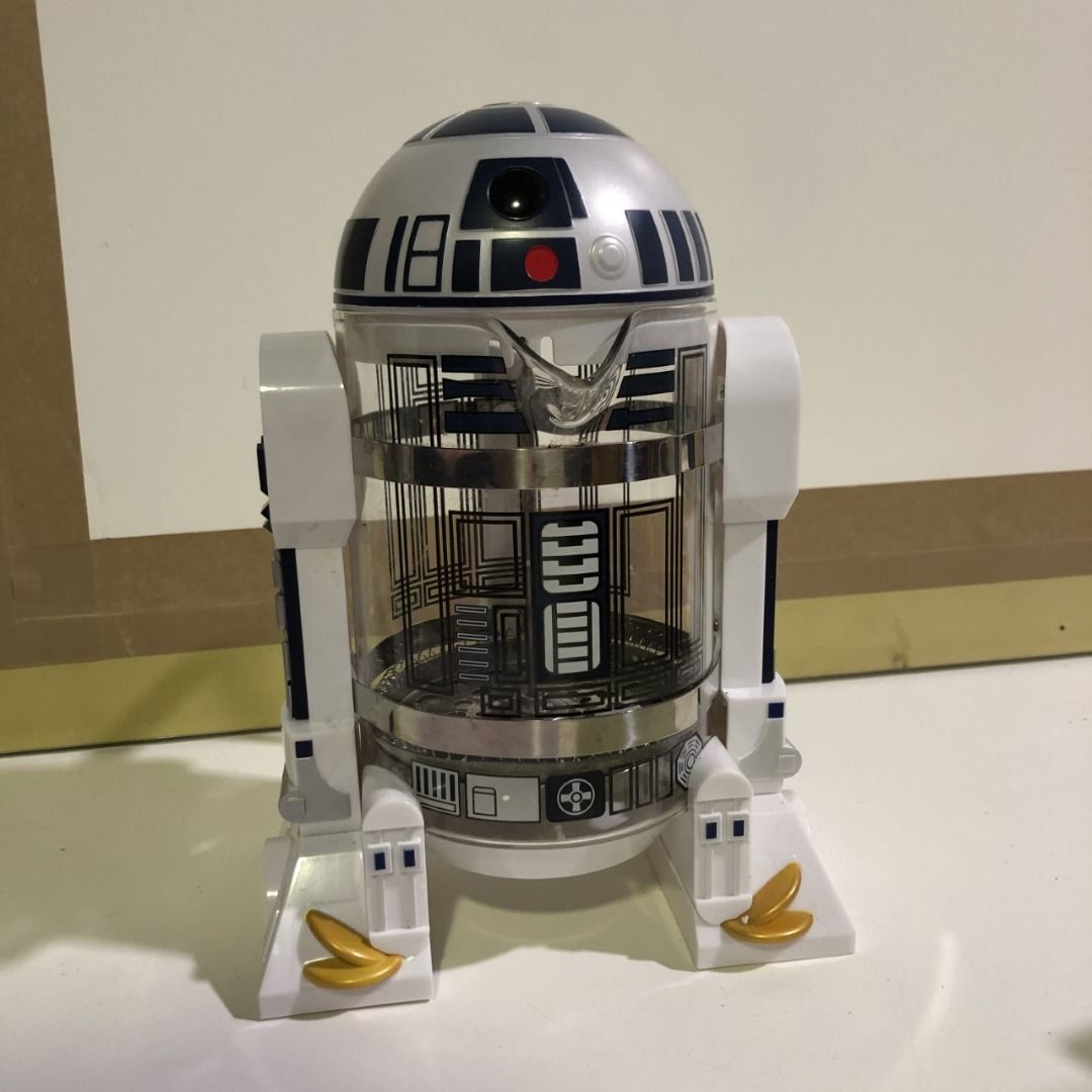 Star Wars R2-D2 French Press Coffee Maker (Category: Coffee Machines & Makers) located in Cebu City. Submitted by buddylimong (Listing ID 1465281258, Image 1). Description: - Official Star Wars R2-D2 themed coffee maker - Durable glass body wrapped in detailed R2-D2 robot housing - Features plastic legs and dome lid - Easy-to-use plunger mechanism pulls right through the top dome - Convenient front spout for easy pouring - Perfect functional kitc